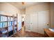 Cozy bedroom with wood-look flooring, closet with sliding doors and an adjoining room at 9450 Niagara Landing St, Las Vegas, NV 89139
