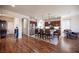 Open kitchen with dark wood cabinets and seating island at 9450 Niagara Landing St, Las Vegas, NV 89139