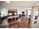 Open-concept kitchen and living room with granite island and modern appliances at 9450 Niagara Landing St, Las Vegas, NV 89139