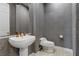 Powder room with metallic wallpaper and pedestal sink at , Las Vegas, NV 89135