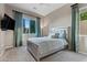 Bedroom featuring silver furniture, ceiling fan, and a large window at , Las Vegas, NV 89135
