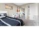 Bedroom with desk and a mirrored closet door at , Las Vegas, NV 89135
