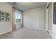 Spacious bedroom with neutral walls, carpet, and large window at , Las Vegas, NV 89135