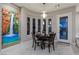 Dining area features a modern pendant light, art decor, and large windows at , Las Vegas, NV 89135
