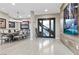 Inviting entryway features modern decor, a large dining table, and stylish artwork at , Las Vegas, NV 89135