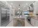 Spacious kitchen features stainless appliances, large island with seating, and marble countertops at , Las Vegas, NV 89135