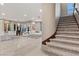 Open concept living area and staircase features modern decor and lots of natural light at , Las Vegas, NV 89135