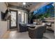 Charming outdoor kitchen featuring a built-in grill and ample seating, perfect for alfresco dining at , Las Vegas, NV 89135