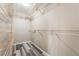 Walk-in closet with ample metal shelving and gray floors at 100 Samantha Rose St, Henderson, NV 89012
