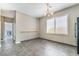 Dining area with tile floors, modern lighting, and large window at 100 Samantha Rose St, Henderson, NV 89012
