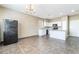 Bright and spacious kitchen featuring white cabinets, modern appliances, and an open floor plan at 100 Samantha Rose St, Henderson, NV 89012