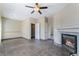 Spacious living room includes fireplace, ceiling fan, and recessed lighting at 100 Samantha Rose St, Henderson, NV 89012