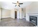 Spacious living room includes fireplace, ceiling fan, and recessed lighting at 100 Samantha Rose St, Henderson, NV 89012