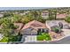Well-maintained single-story home showcasing lush lawn, landscaping, and a convenient three-car garage at 10213 Treasure Mountain Ct, Las Vegas, NV 89129
