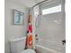 Bathroom with a shower/tub combo with colorful curtain and a picture of a mermaid at 10213 Treasure Mountain Ct, Las Vegas, NV 89129