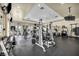 Functional gym with modern exercise equipment and natural lighting at 10213 Treasure Mountain Ct, Las Vegas, NV 89129