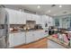 Spacious kitchen with ample counter space, white cabinets, and modern appliances at 10213 Treasure Mountain Ct, Las Vegas, NV 89129