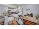 Stylish eat-in kitchen with a breakfast bar, stainless steel appliances, and ample cabinet space at 10213 Treasure Mountain Ct, Las Vegas, NV 89129