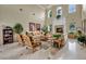 Bright living room featuring high ceilings, fireplace, and tasteful furnishings at 10213 Treasure Mountain Ct, Las Vegas, NV 89129