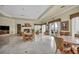 Spacious meeting room with tiled floor, large windows, and ample seating at 10213 Treasure Mountain Ct, Las Vegas, NV 89129