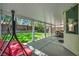 Inviting covered patio with a swing and views of the well-maintained backyard at 10213 Treasure Mountain Ct, Las Vegas, NV 89129