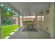 Charming covered patio with outdoor dining area, perfect for entertaining guests at 10213 Treasure Mountain Ct, Las Vegas, NV 89129