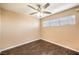 This bedroom features hardwood floors, natural light and a ceiling fan at 1030 Tam O Shanter, Las Vegas, NV 89109