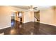 Spacious living area with hardwood floors flowing into other rooms, offering an open layout at 1030 Tam O Shanter, Las Vegas, NV 89109