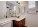 Well-lit bathroom with modern fixtures, vanity, and decorative accents, offering a clean aesthetic at 10519 Bella Camrosa Dr, Las Vegas, NV 89141
