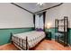 Cozy bedroom with decorative details and a comfortable bed, creating a relaxing retreat at 10519 Bella Camrosa Dr, Las Vegas, NV 89141