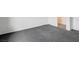 Minimal bedroom featuring neutral walls and grey carpeting at 10519 Bella Camrosa Dr, Las Vegas, NV 89141