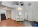 A two story foyer with hardwood floors and a staircase leading to the second floor at 10519 Bella Camrosa Dr, Las Vegas, NV 89141