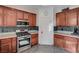 Kitchen with stainless steel oven, granite countertops, and ample cabinet space, perfect for cooking at 10519 Bella Camrosa Dr, Las Vegas, NV 89141