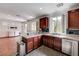 Granite countertop kitchen with stainless steel appliances and ample cabinet space, great for entertaining at 10519 Bella Camrosa Dr, Las Vegas, NV 89141