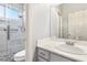 Well-lit bathroom with modern finishes, a glass-enclosed shower, and modern finishes at 1084 Little House Ct, Henderson, NV 89011