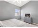 Bedroom featuring gray walls and plush carpet with a television atop a dresser at 1084 Little House Ct, Henderson, NV 89011
