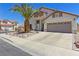 Attractive single-Gathering home with a desert-style front yard and attached garage at 1084 Little House Ct, Henderson, NV 89011