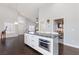 Open concept kitchen features granite countertops and stainless steel appliances at 1084 Little House Ct, Henderson, NV 89011