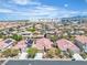 Aerial view of the property at 10886 Porto Foxi featuring a desert landscape and red tiled roof at 10886 Porto Foxi St, Las Vegas, NV 89141
