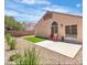 Private backyard features a patio area and desert landscaping at 10886 Porto Foxi St, Las Vegas, NV 89141