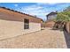 Low-maintenance backyard featuring gravel and minimal landscaping at 10886 Porto Foxi St, Las Vegas, NV 89141