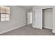 Bedroom featuring neutral paint, carpet, closet and window at 10886 Porto Foxi St, Las Vegas, NV 89141