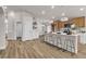 The kitchen is complete with a breakfast bar, modern appliances, and ample cabinet space at 10886 Porto Foxi St, Las Vegas, NV 89141