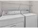 Convenient laundry area with full-size washer and dryer at 10886 Porto Foxi St, Las Vegas, NV 89141