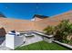 Inviting backyard features a stone fire pit, synthetic grass, and string lights at 10968 Tracy Stevens Ave, Las Vegas, NV 89166