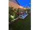 Inviting backyard with water feature and stylish landscape at 10968 Tracy Stevens Ave, Las Vegas, NV 89166