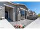 Charming home featuring a welcoming front entrance with a cozy porch and stone accents at 10968 Tracy Stevens Ave, Las Vegas, NV 89166