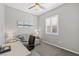 Versatile office space with a comfortable couch and a spacious desk area at 10968 Tracy Stevens Ave, Las Vegas, NV 89166