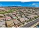 Expansive aerial view of neighborhood with golf course, showcasing the community layout at 1113 Via Della Costrella, Henderson, NV 89011