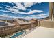 Enjoy stunning views from this spacious balcony overlooking the pool, neighborhood, and mountains at 1113 Via Della Costrella, Henderson, NV 89011